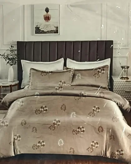 Beige floral print 100% cotton double bedsheet with two matching pillow covers on a bed with dark upholstered headboard