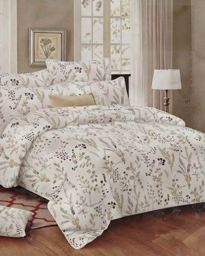 Elegant floral print bedding set on a beautifully styled bedroom bed