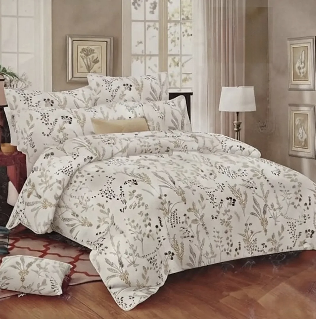 Elegant floral print bedding set on a beautifully styled bedroom bed