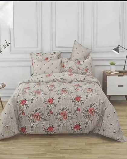 Red rose floral print cotton bedsheet set on double bed with pillow covers
