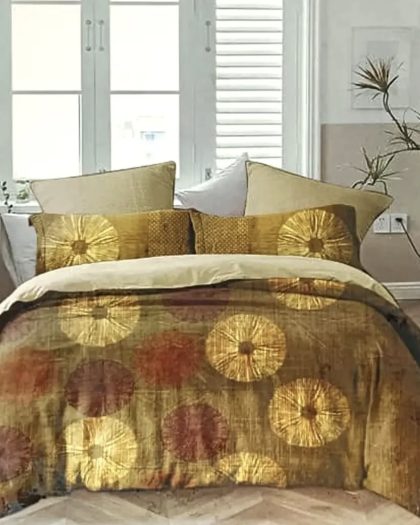 Elegant golden and brown bedspread with artistic circular floral patterns and matching decorative cushions