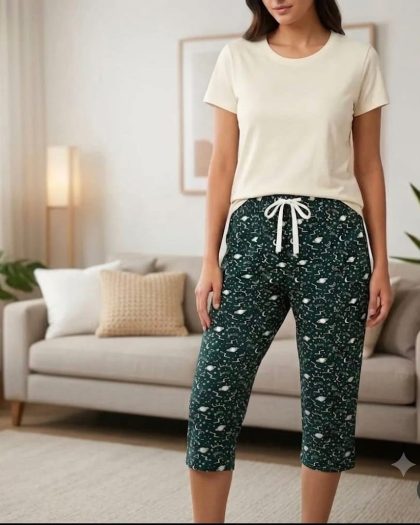 Women's dark green printed pajama pants with white drawstring waist