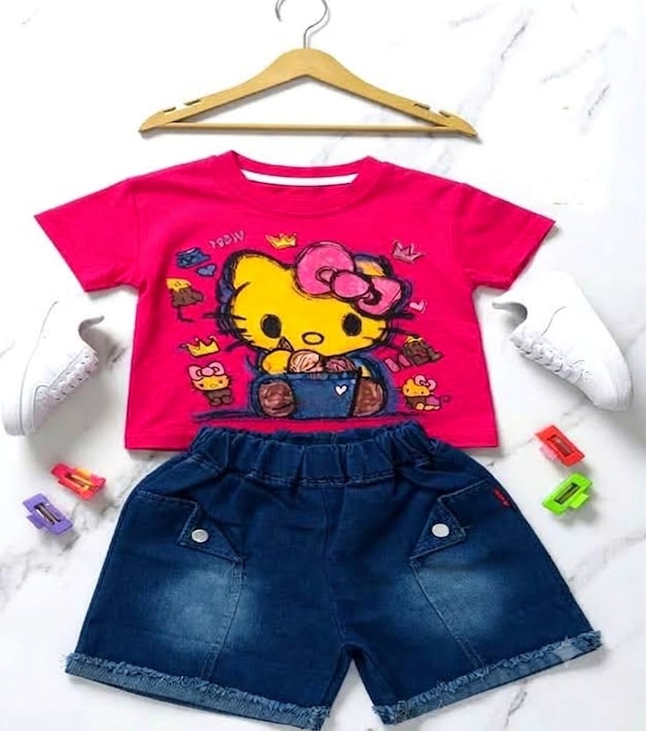 Girls pink graphic t-shirt with character print and dark blue denim shorts